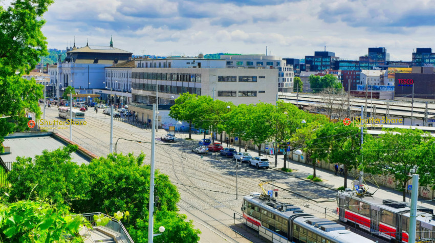 Bustling Urban Street with Trams - Brno, Czech Republic