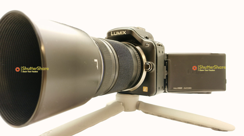 Lumix G7 Mirrorless Camera with Lens and Tripod