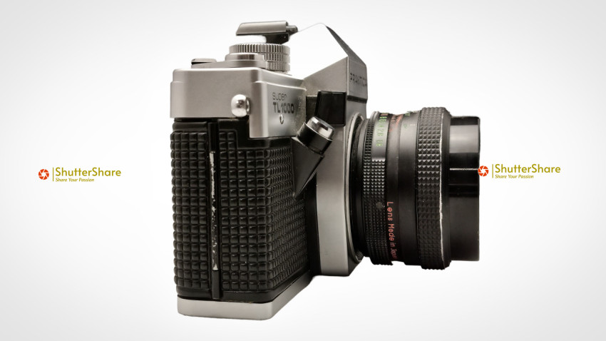 Vintage PRAKTICA SUPER TL1000 35mm Film Camera with Lens