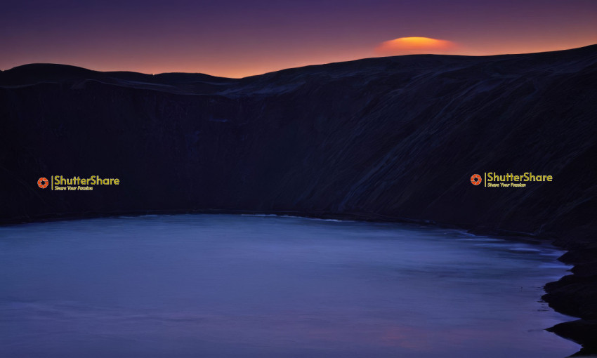 Twilight Embrace of Mountains and Lake