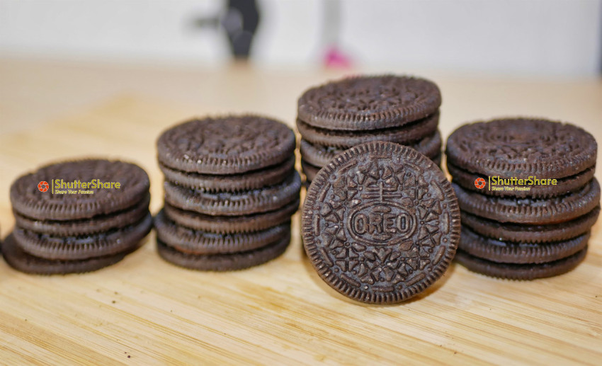 Stacks of Oreo Cookies on Wooden Surface