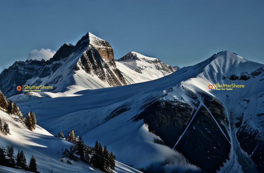 Snow-Clad Peaks at Sunrise