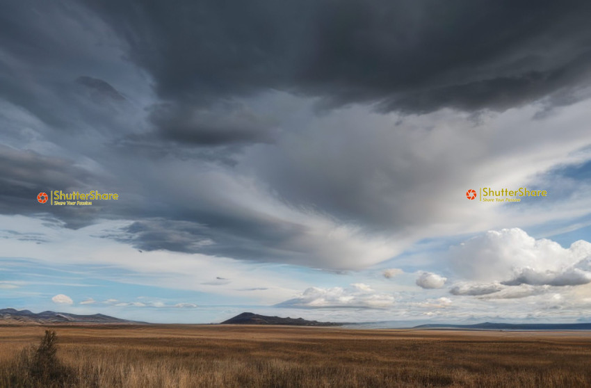 Dramatic Storm Clouds over Expansive Grasslands