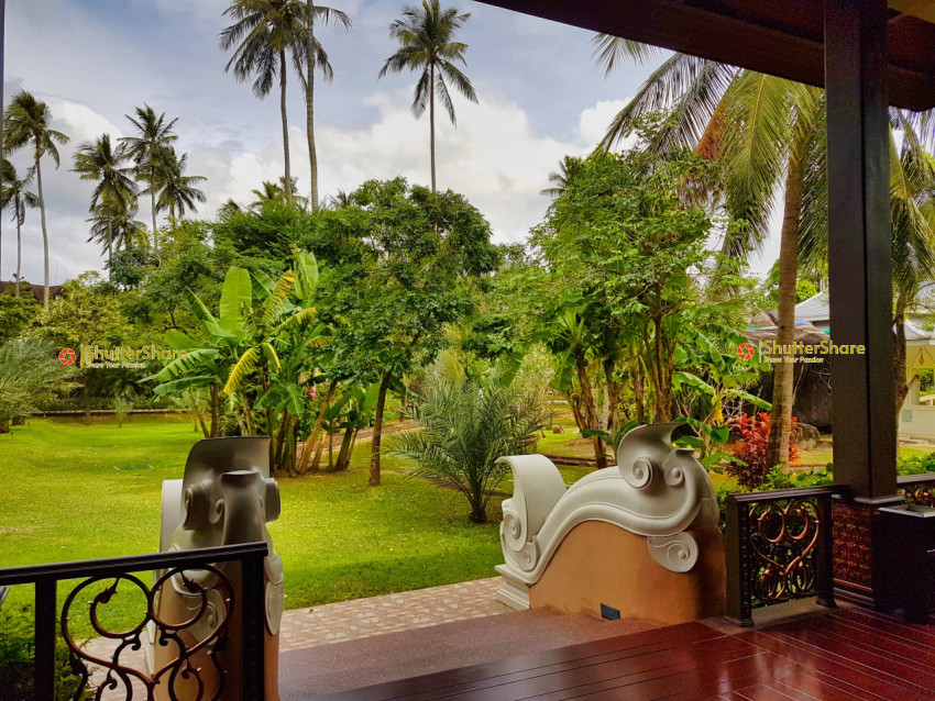 Tropical Garden View from a Decorative Veranda in Thailand