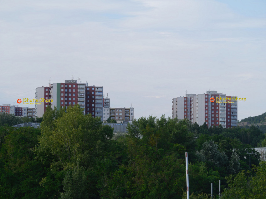 Panelák Skyline Amidst Greenery