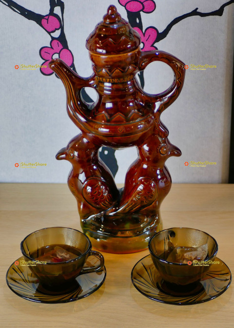 Ornate Ceramic Tea Set with Tea Cups
