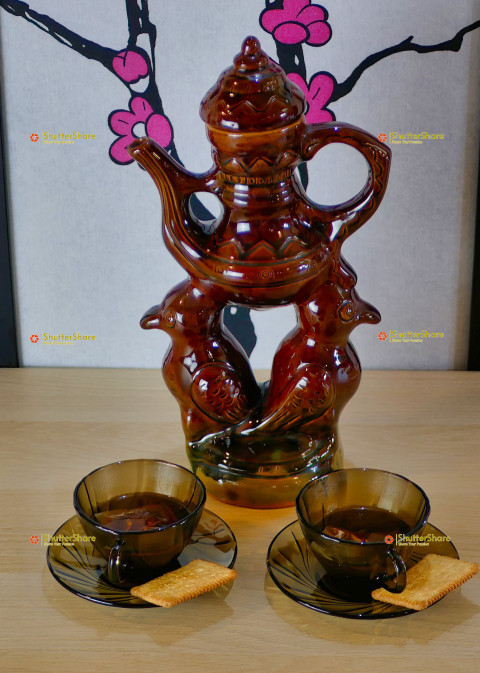 Vintage Tea Set with Decorative Teapot and Cups