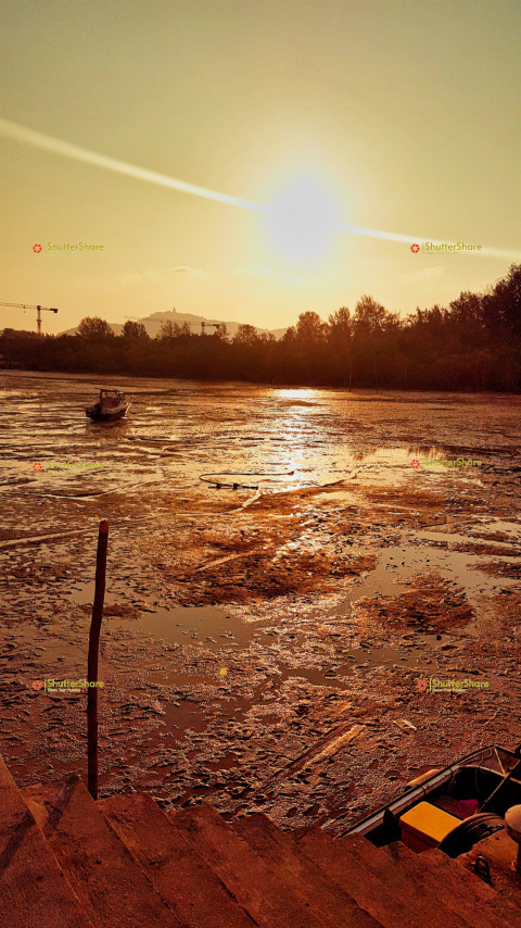 Sunset Over Low Tide in Thailand