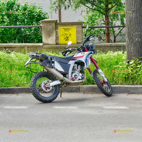 AJP Motorcycle Parked by a Tree - Brno, Czech Republic